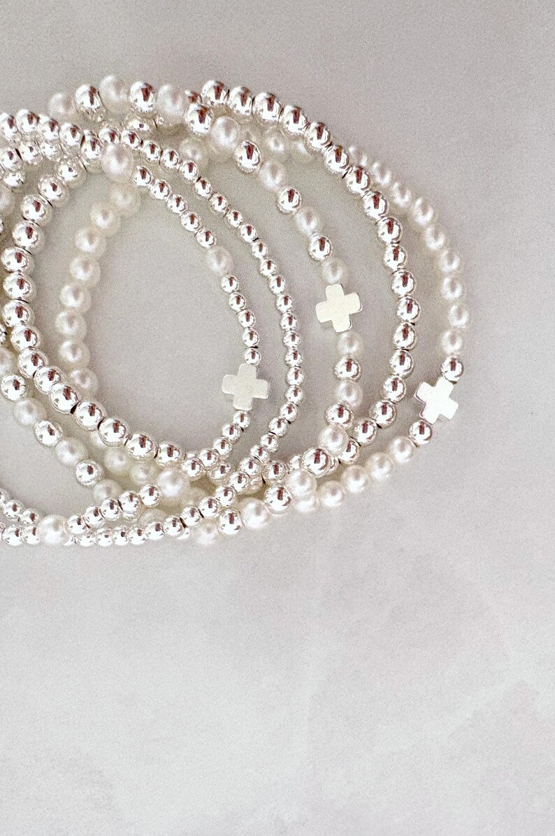 The Silver Pearl Cross Collection