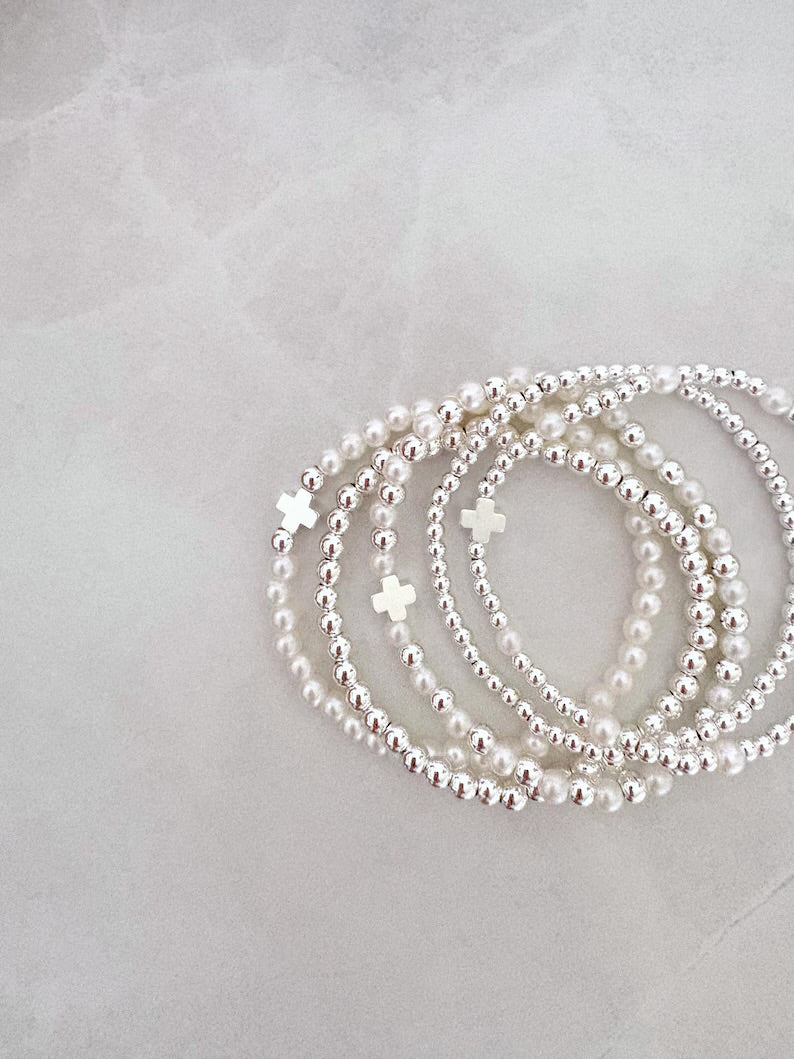 The Silver Pearl Cross Collection