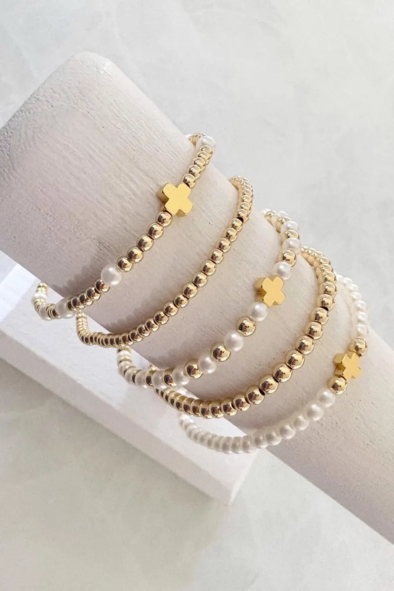 The Pearl Cross Collection